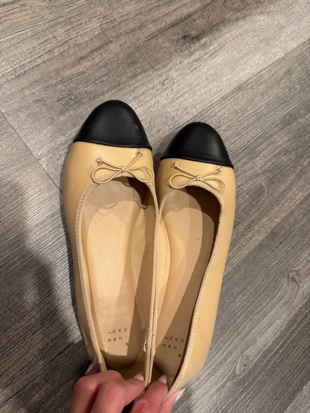 a new day Beige Flats with Black Toe Cap